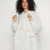 Sweaty Betty Free Fall Jacket - Parka - White 1 Sweaty Betty Free Fall Jacket - Parka - White -Mode et Luxe Boutique 39db3a9e39404e24a7ff30b3ccba5c25