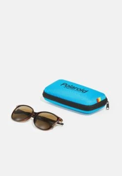 Polaroid Lunettes De Soleil - Havana -Mode et Luxe Boutique 476cc02fa8f34c20a3659b9576a9ff72