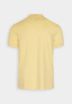 Lacoste Unisex - Polo - Yellow -Mode et Luxe Boutique 5454dda9a9bd4d3f8cce8659293d5526