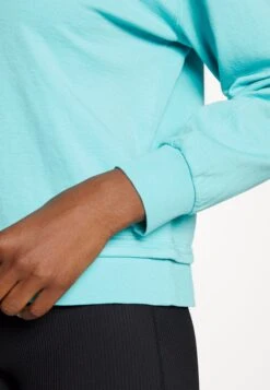 Athleta Sundown - Sweatshirt - Gulf Green -Mode et Luxe Boutique e5d8ee3041b54c79a2a01ce61881b73e